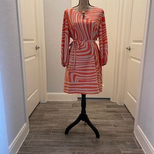 Orange and beige mid length dress, polyester material with lining. Worn once!